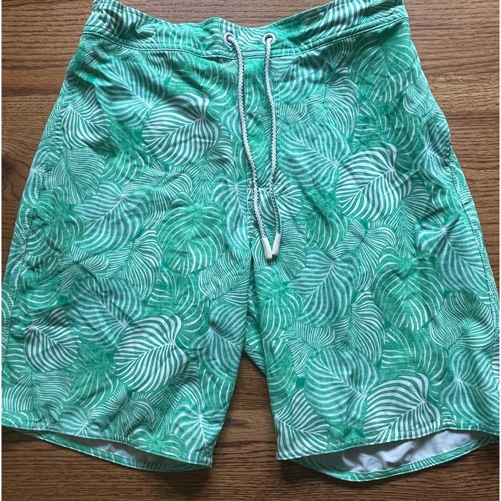 Johnnie-O swim shorts- green leaf design- size men’s large elastic in back.